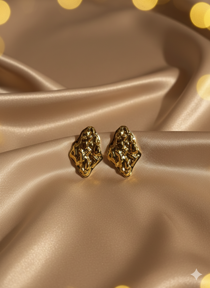 Artistic gold earrings